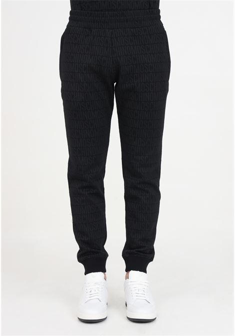 Black men's trousers with all over logo MOSCHINO | Pants | A031926291555