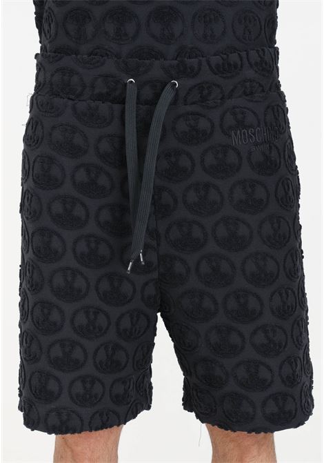 Black men's shorts with allover sponge logo MOSCHINO | Shorts | A070594060555