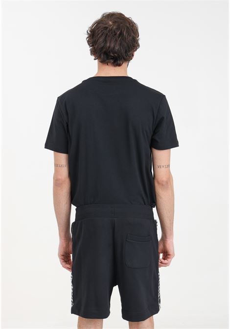 Black men's shorts MOSCHINO | V670394100555