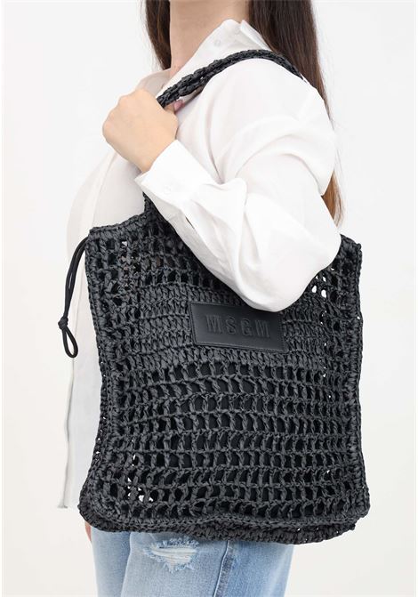 Black women's beach bag with woven perforated texture and logo patch MSGM | Bags | S4MSJGBA059110