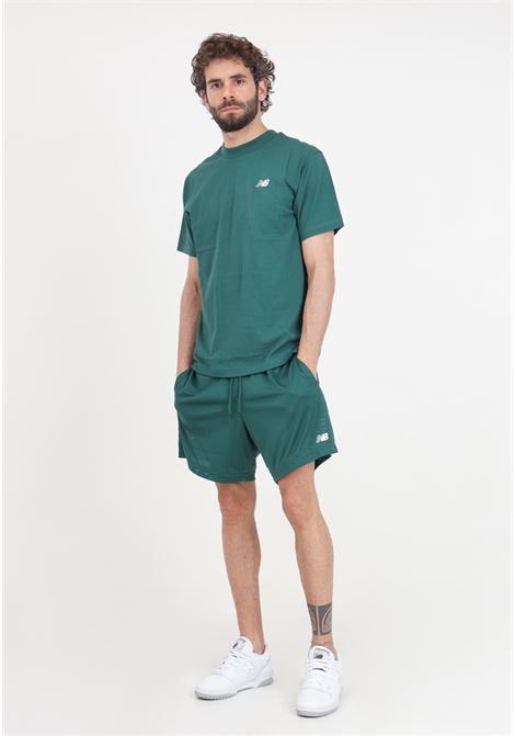 Green men's shorts NB small logo mesh 7 inch NEW BALANCE | Shorts | MS41515NWG335