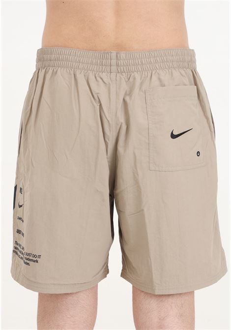 Shorts mare beige da uomo Nike 7 Volley Short NIKE | Beachwear | NESSE506232