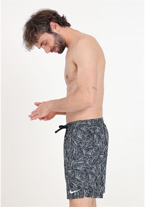Black men's swim shorts with allover print and swoosh NIKE | Beachwear | NESSE522001