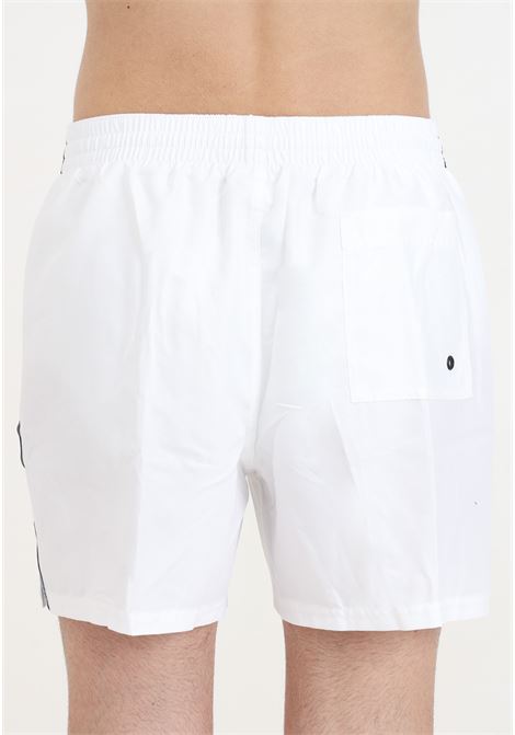 Shorts mare bianco da uomo Nike Tape NIKE | Beachwear | NESSE559100