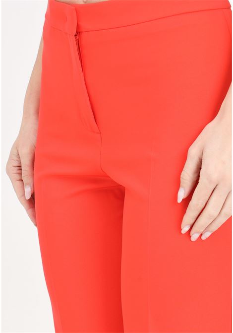 Pantaloni da donna arancioni flared tecnico stretch PINKO | Pantaloni | 100054-A0HMB02