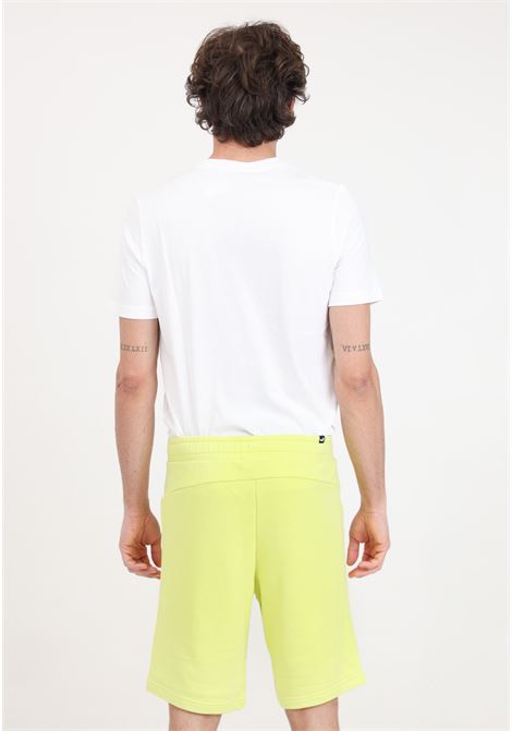 ESS+ Col lime green sports shorts for men PUMA | Shorts | 58676638