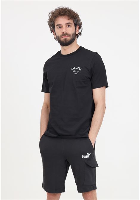 Black men's shorts with ESS Cargo logo print PUMA | Shorts | 67336601