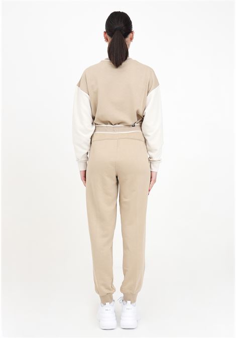 Puma SQUAD Pants TR women's sports trousers beige PUMA | Pants | 67790183