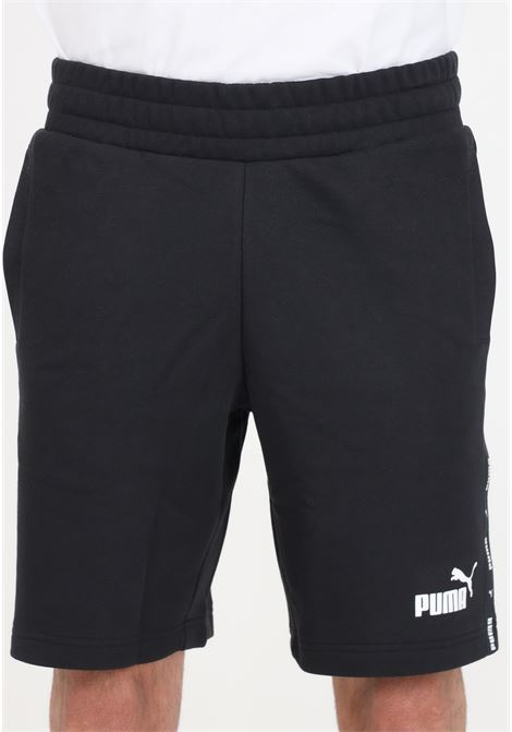 Essentials+ Tape men's black shorts PUMA | 84738701