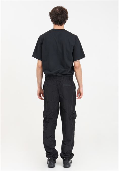 Black men's trousers with drawstring hem and waist RAINS | RA19200BLA
