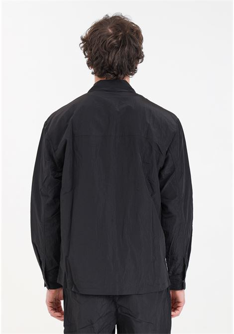 Black men's windbreaker with large pockets on the front RAINS | RA19220BLA