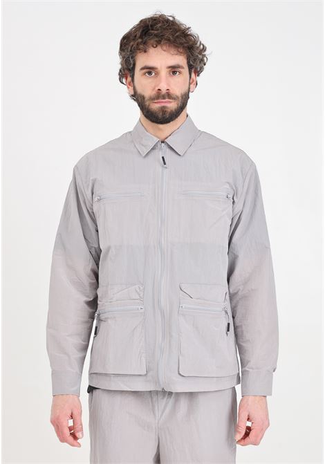 Gray men's windbreaker with large pockets on the front RAINS | RA19220FLI