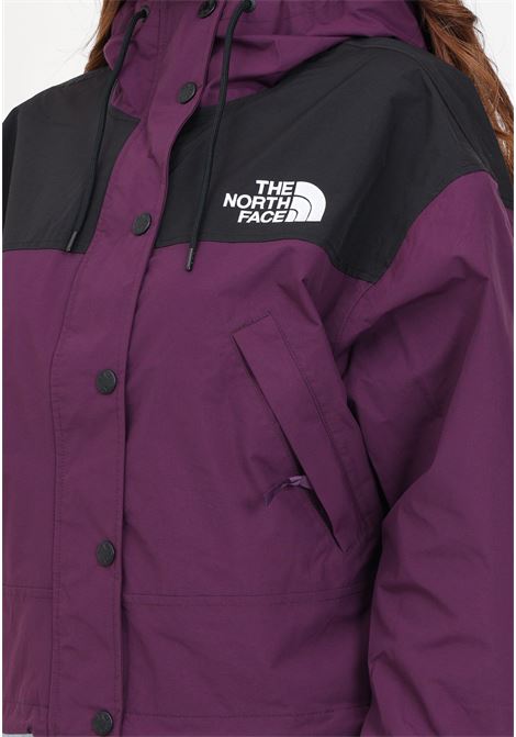 Tnf Black Reign On women's windbreaker in black and purple THE NORTH FACE | NF0A3XDC6NR16NR1