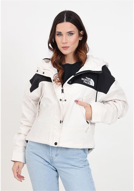 Tnf Black Reign On women's windbreaker in black and white THE NORTH FACE | Jackets | NF0A3XDCROU1ROU1