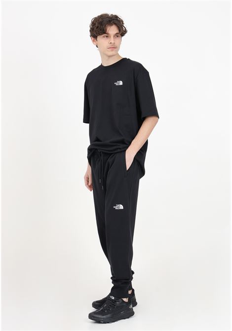 Tnf Black men's trousers with contrasting logo THE NORTH FACE | Pants | NF0A4T1FJK31JK31