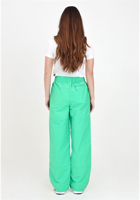 Pantaloni da donna verde tnf easy wind THE NORTH FACE | Pantaloni | NF0A8769PO81PO81