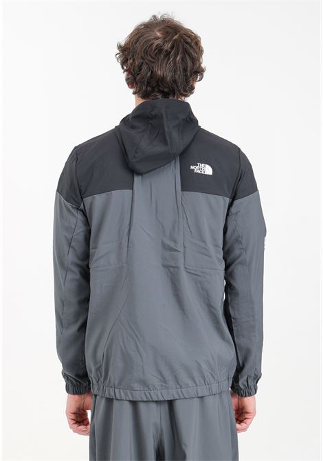 Black and gray Wind track men's windbreaker with hood THE NORTH FACE | NF0A87J2MN81MN81