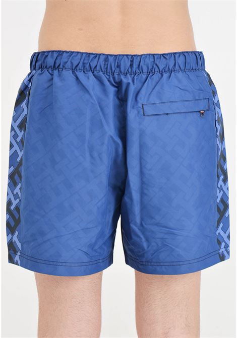 Shorts mare blu da uomo con stampa monogram TH TOMMY HILFIGER | UM0UM032110G3