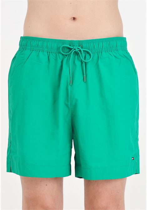 Green men's swim shorts with small logo TOMMY HILFIGER | Beachwear | UM0UM03280L4B