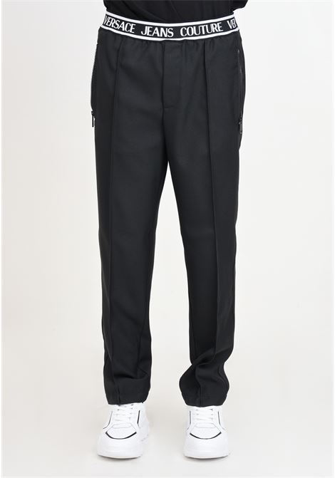 Pantaloni neri con banda elastica logata VERSACE JEANS COUTURE | Pantaloni | 76GAA109N0309899