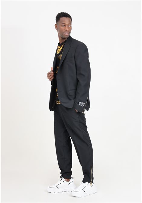 Pantaloni da uomo neri con zip alle caviglie metallo dorato VERSACE JEANS COUTURE | Pantaloni | 76GAA122N0307899