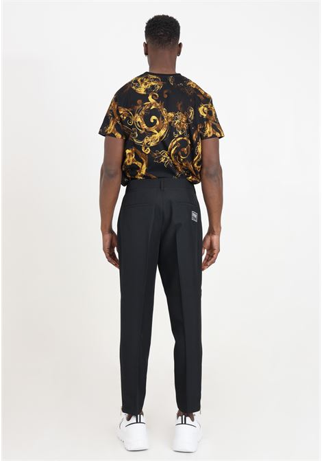 Black men's trousers with golden metal ankle zips VERSACE JEANS COUTURE | 76GAA122N0307899