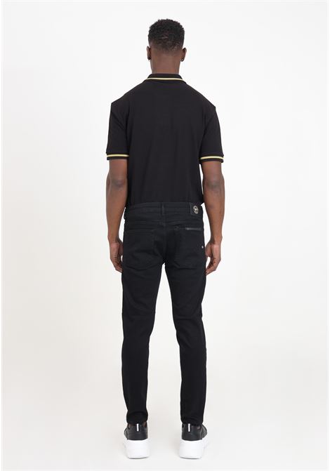 Pantaloni neri da uomo skinny fit con etichetta logata metallo dorato VERSACE JEANS COUTURE | 76GAB540CDW00909
