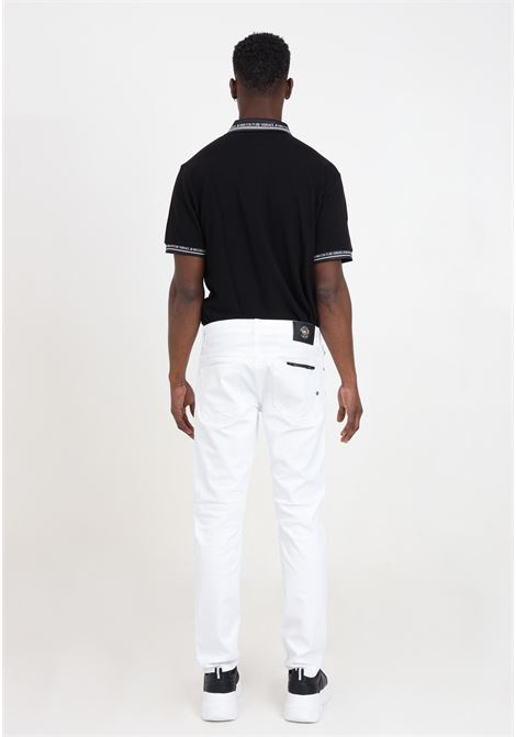 White narrow fit men's trousers with golden metal logo label VERSACE JEANS COUTURE | Pants | 76GAB5D0CEW01003