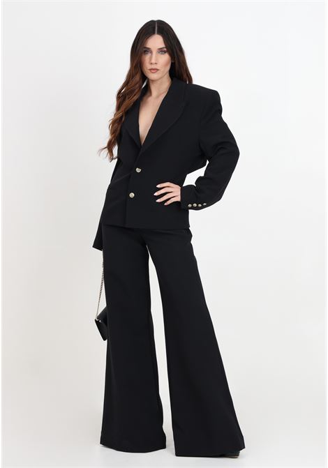 Pantaloni neri da donna con elastico logato VERSACE JEANS COUTURE | 76HAA112N0103899